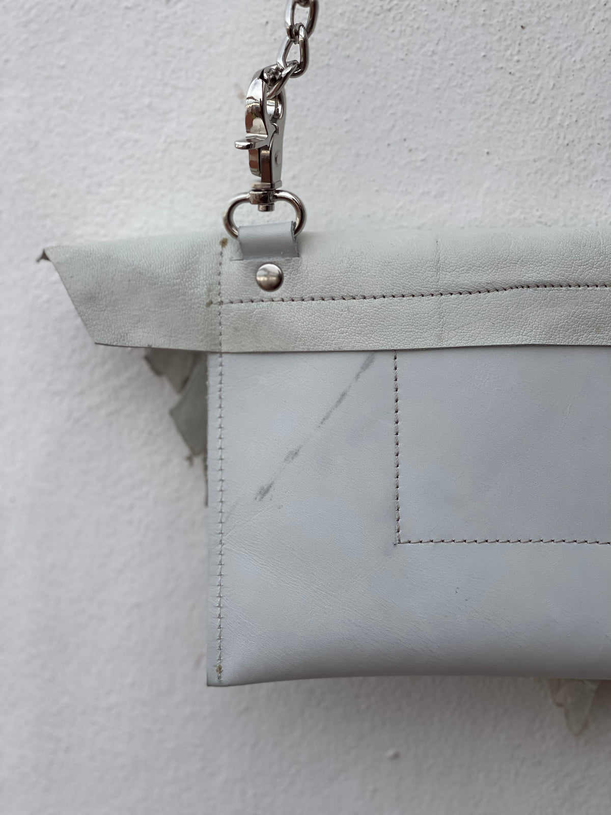 Salt Memory torn leather edge detail
