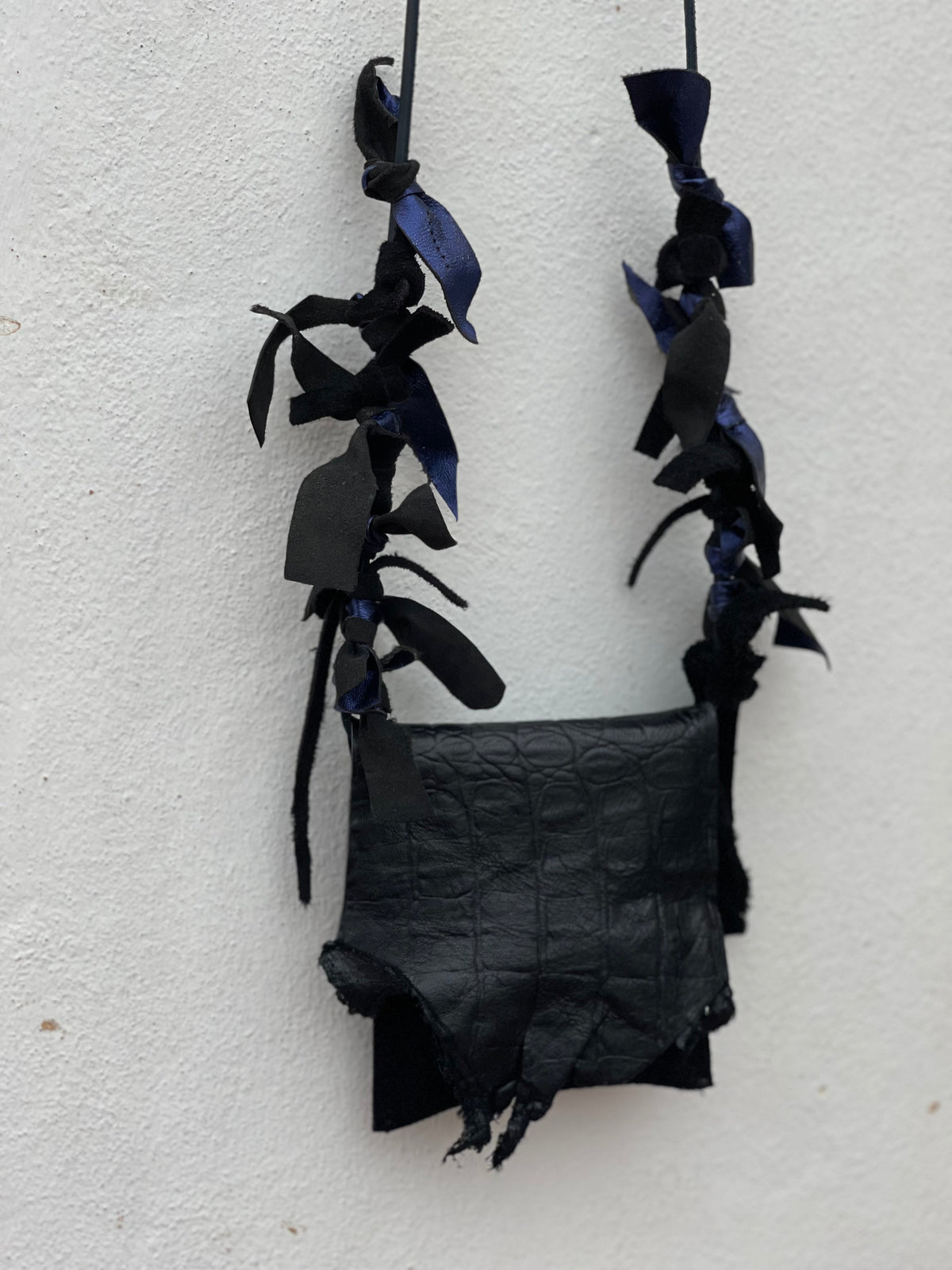 Nocturne bag feather and leaf strap detail